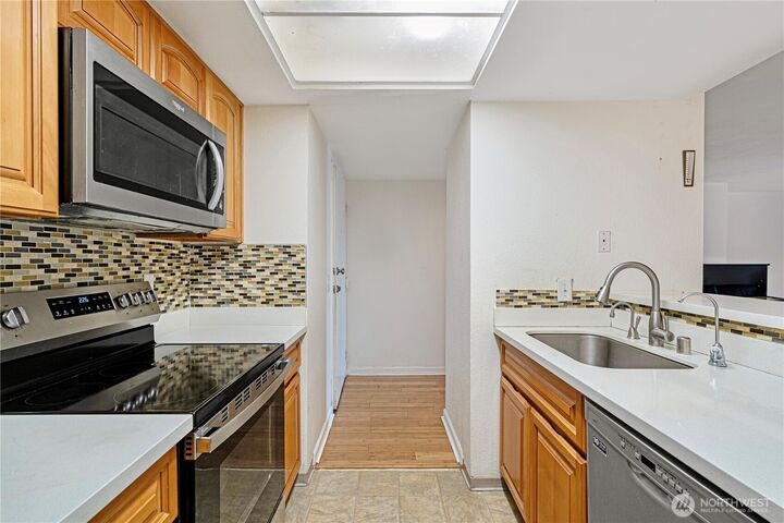 Property Photo:  611 SW 5th Court A206  WA 98057 