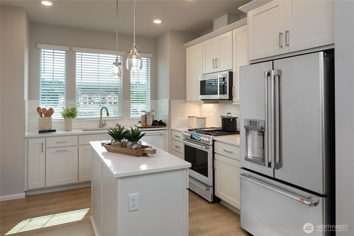 Property Photo:  19288 NE 69th Circle 103  WA 98052