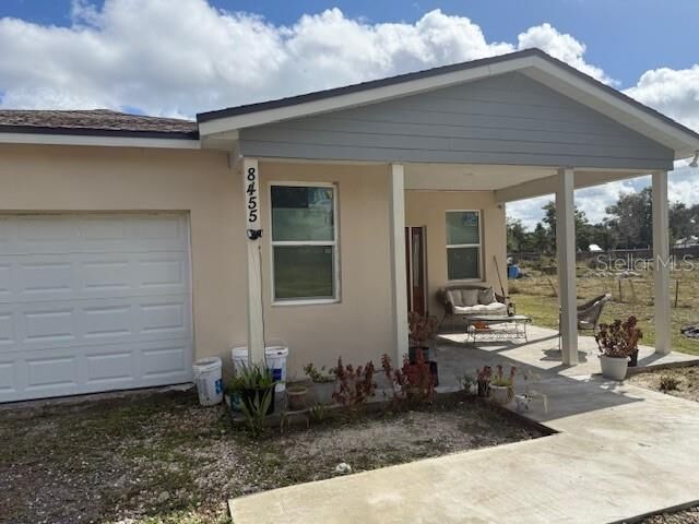 Property Photo:  8455 A D Mims Road  FL 32818 
