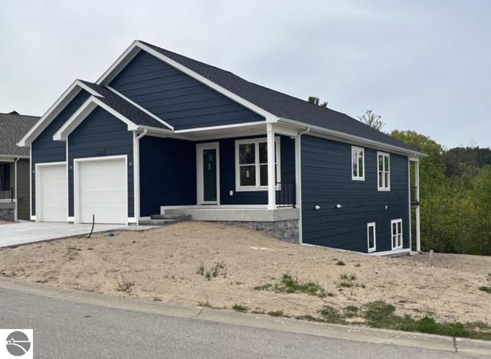 Property Photo:  13828 S Azmiuth Drive  MI 49684 