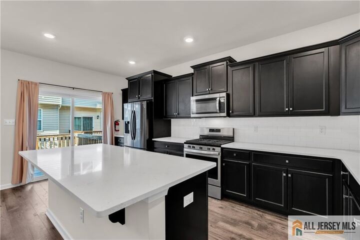 Property Photo:  504 E International Road 504  NJ 08831 