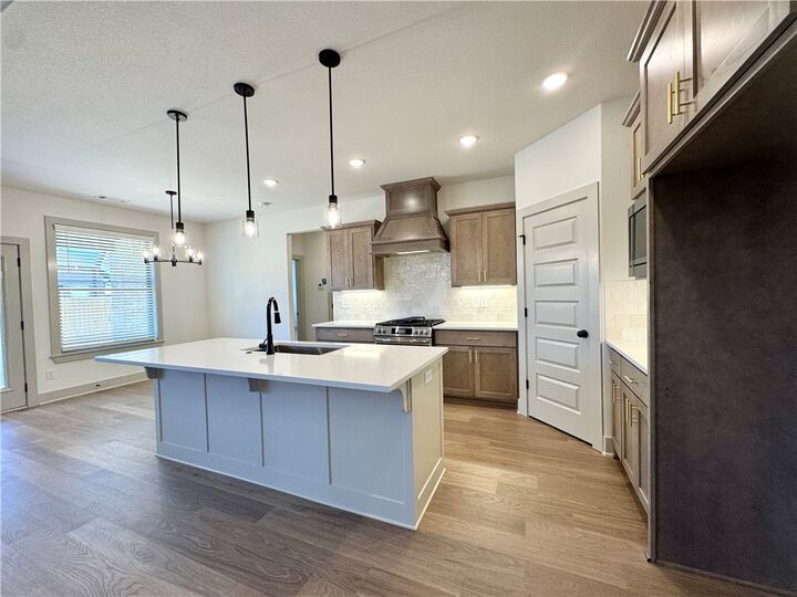 Property Photo:  4804 SW Scarlet Oak Street  AR 72713 