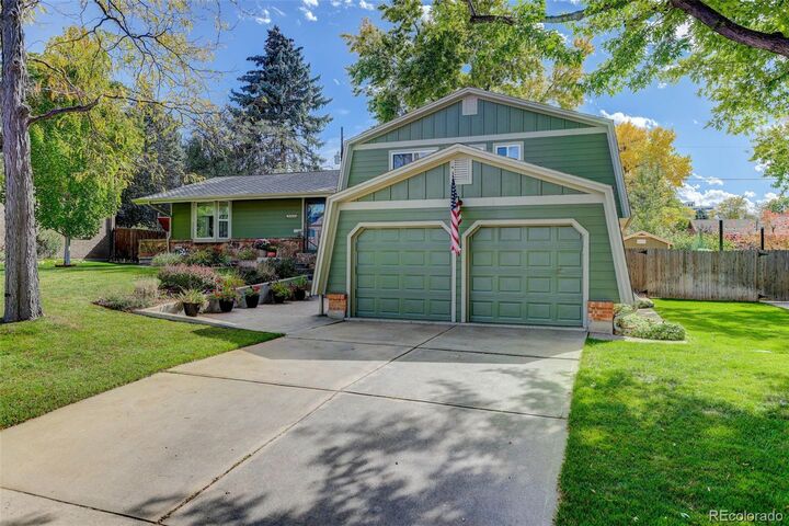 Property Photo: 9044 E Floyd Avenue CO 80231