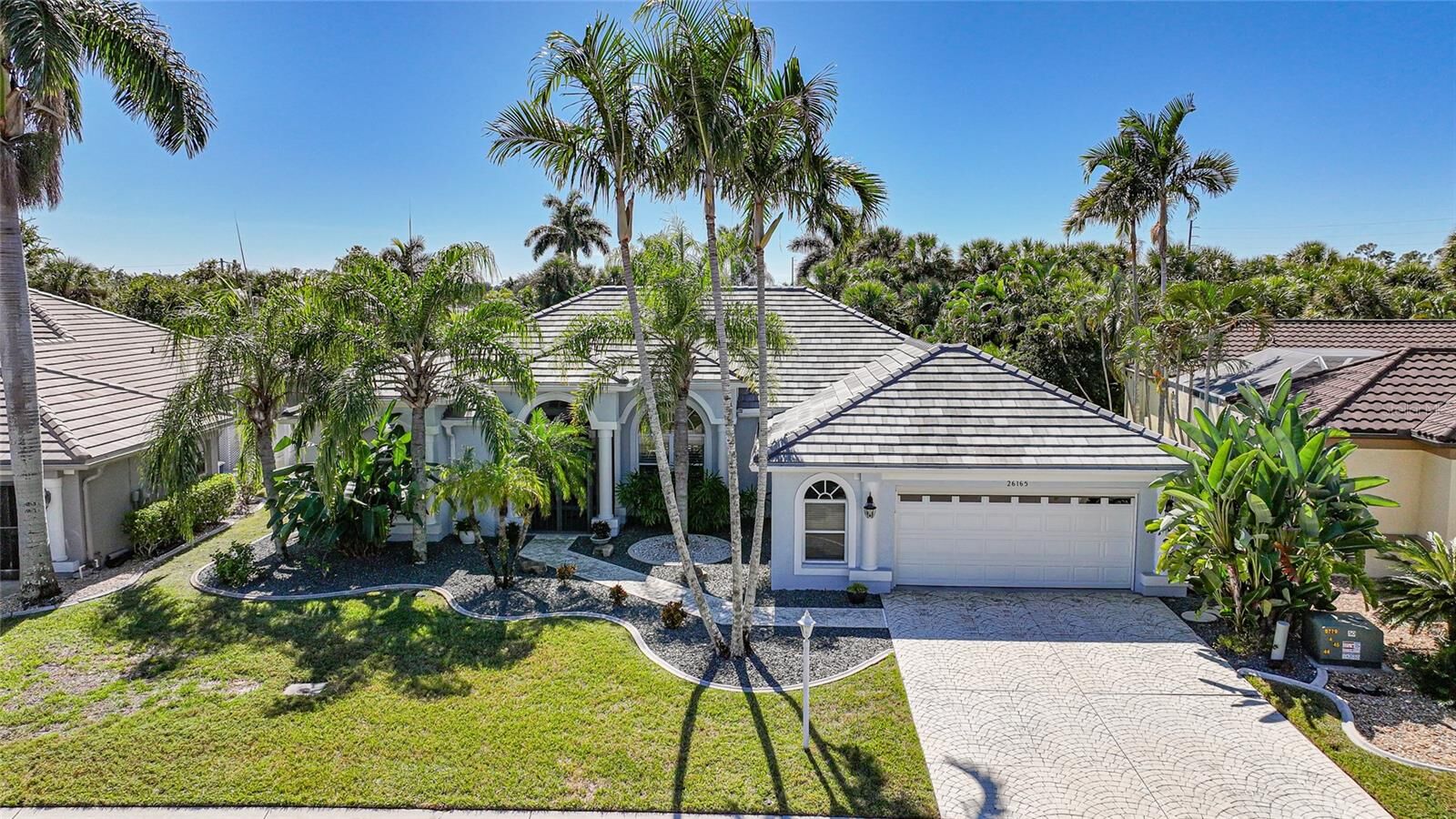 Property Photo:  26165 Feathersound Drive  FL 33955 