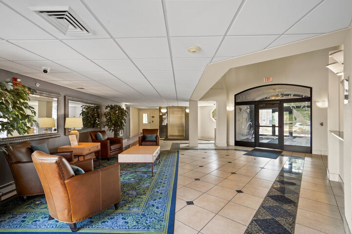 Property Photo:  100 E Main St 307  WI 53186 