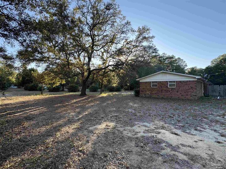 Property Photo:  5636 Camellia Ave  FL 32570 