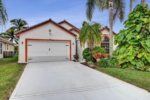 Property Photo: 1628 Carriage Brooke Drive FL 33414