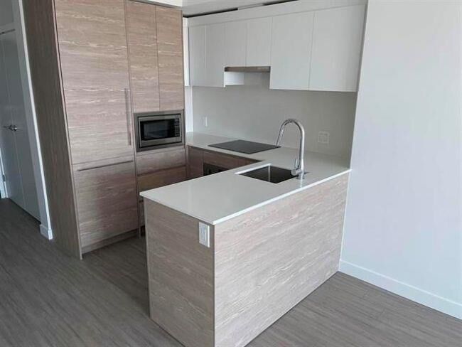 Property Photo: 13655 Fraser Highway 2502 BC V3T 0P8