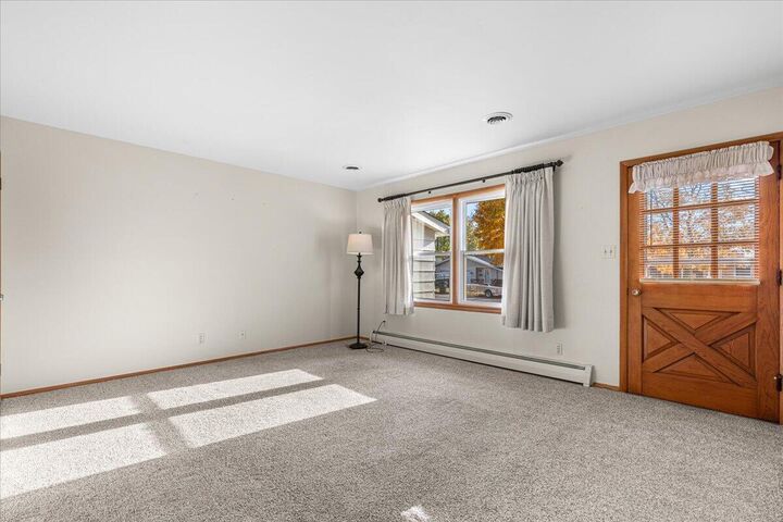 Property Photo: 808 Meadowbrook Dr WI 53090