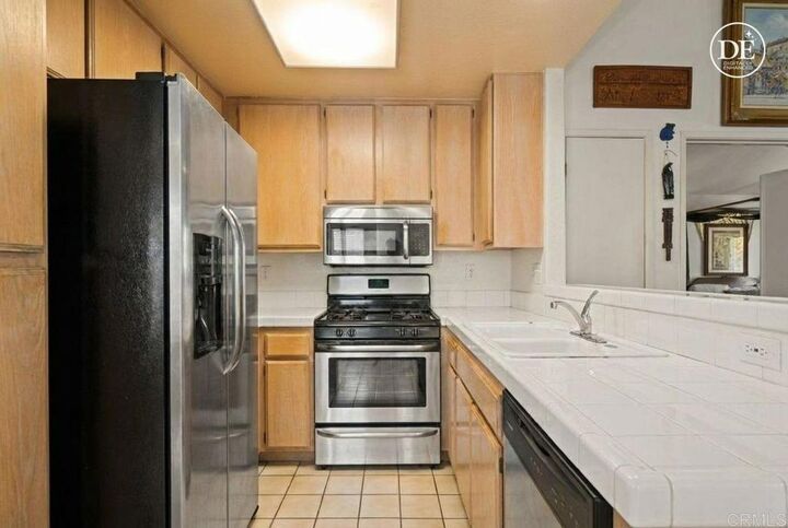 Property Photo:  430 Stoney Point Way 129  CA 92058 