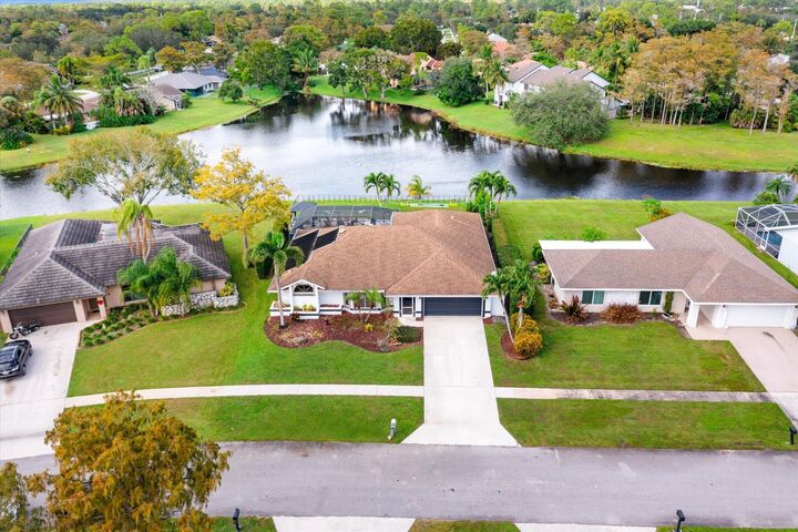 Property Photo: 13947 Geranium Place FL 33414
