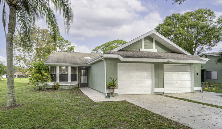 Property Photo:  1437 SE Rivergreen Circle  FL 34952 