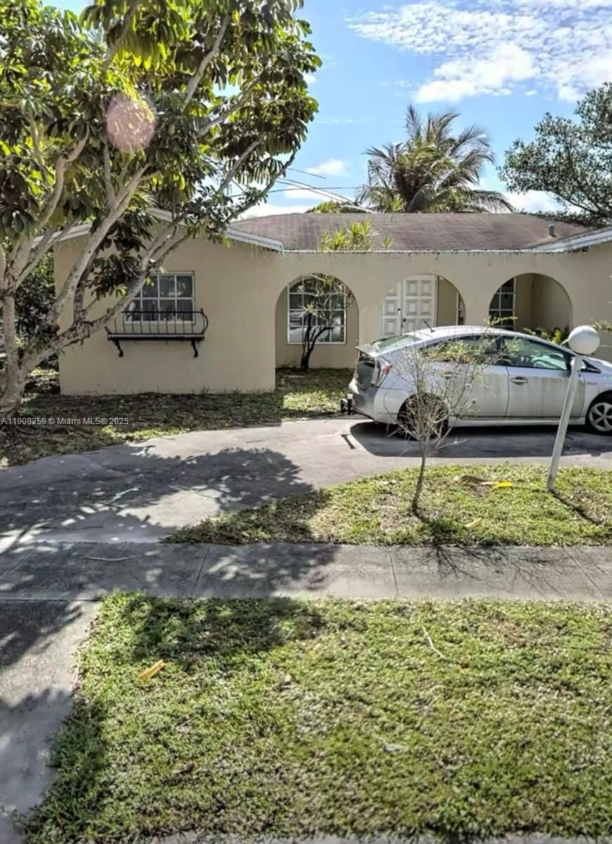 Property Photo:  4981 SW 7th St  FL 33068 