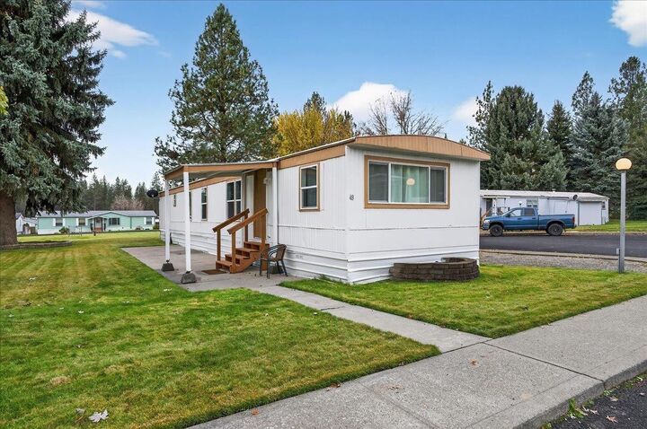 Property Photo: 3110 E Chattaroy Rd 48 WA 99003