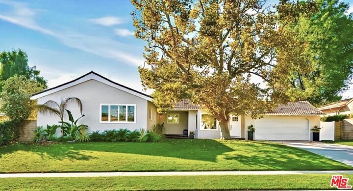 Property Photo:  11001 Garden Grove Ave  CA 91326 