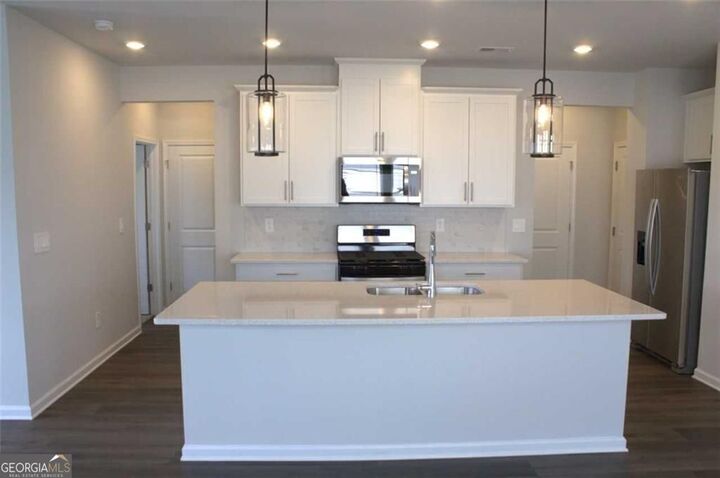 Property Photo:  2038 Avalon Ridge SE  GA 30013 