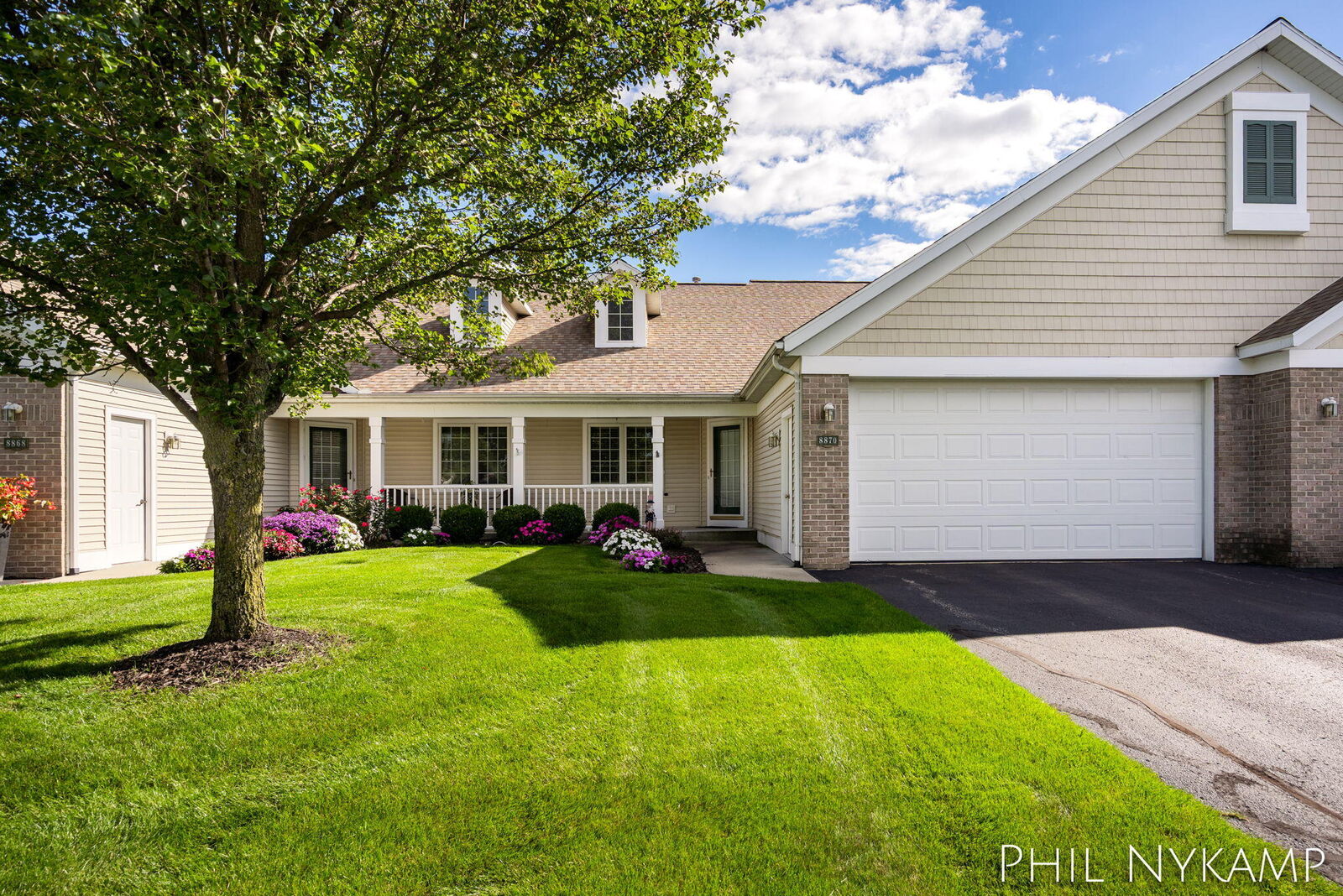 Property Photo:  8870 N Peninsula Court  MI 49464 