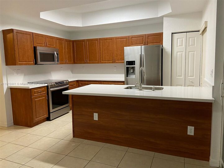 Property Photo:  1002 SW 144th Ave 605  FL 33027 