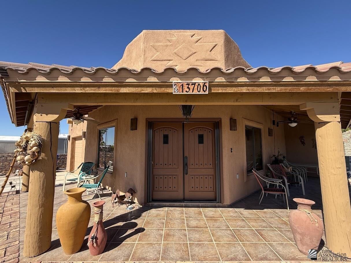 Property Photo: 13706 E 53 Ln AZ 85367