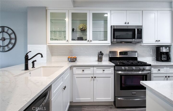 Property Photo:  220 Nice Lane 215  CA 92663 