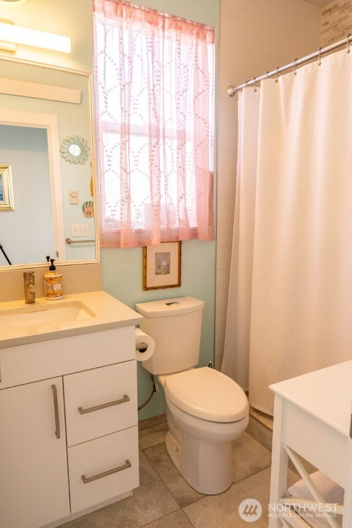 Property Photo:  4409  44th Avenue SW C  WA 98116 