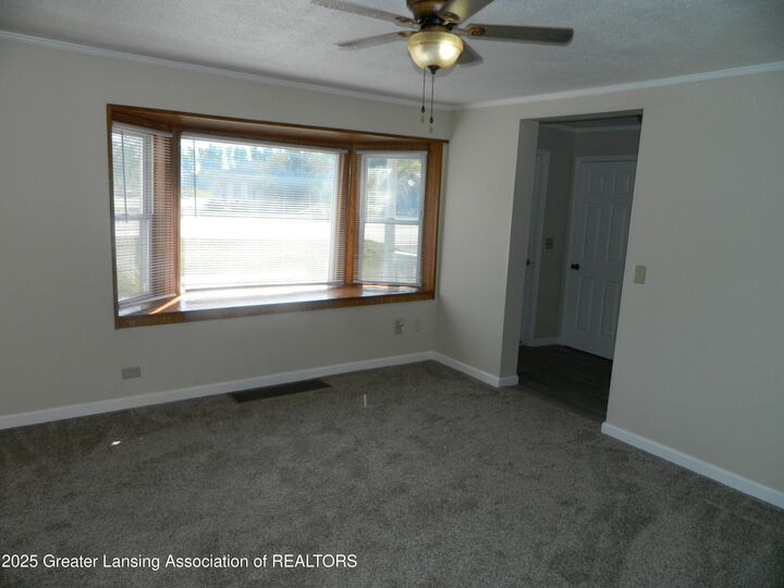 Property Photo:  2936 Jolly Road  MI 48864 