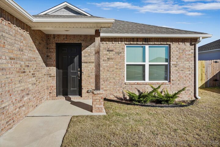 Property Photo: 14719 E 39th Street S OK 74134