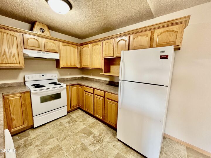 Property Photo: 4020 McKenzie Drive SE 7 ND 58554