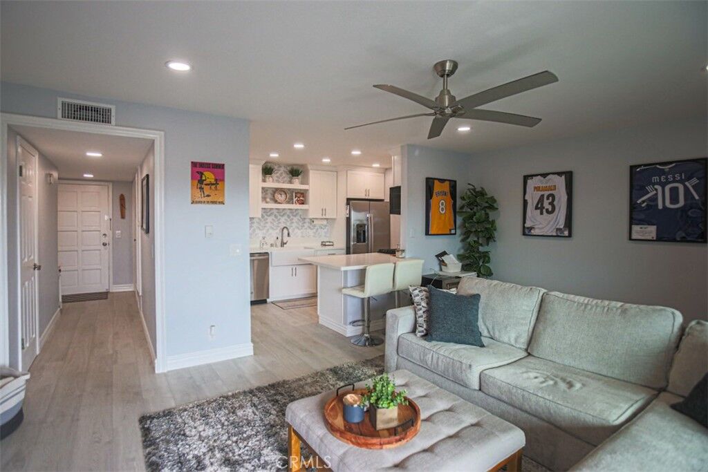 Property Photo:  6600 Warner Avenue 102  CA 92647 