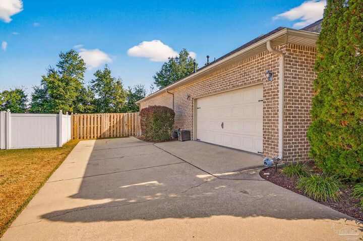 Property Photo:  5975 Arch Ave  FL 32526 