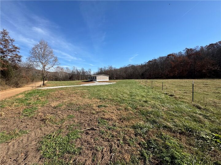 Property Photo:  6444 Madison  AR 72740 