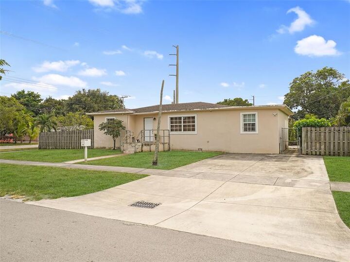 Property Photo:  500 NW 120th St  FL 33168 