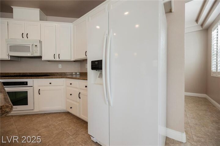 Property Photo:  9509 Gainey Ranch Avenue  NV 89147 