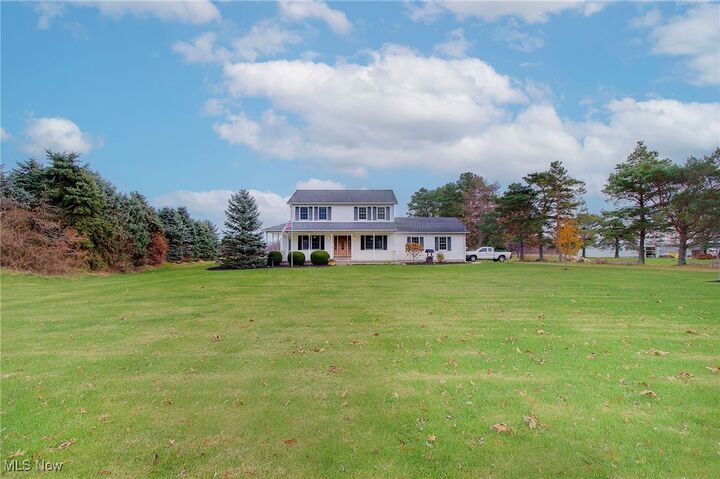 Property Photo:  6116 N Barnes Road N  OH 44089 