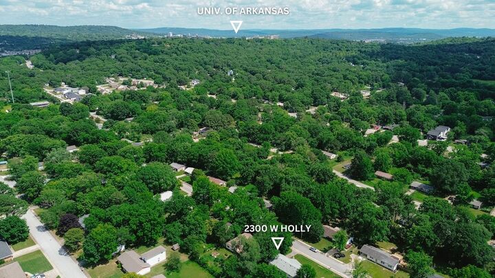 Property Photo:  2300 W Holly Street  AR 72703 