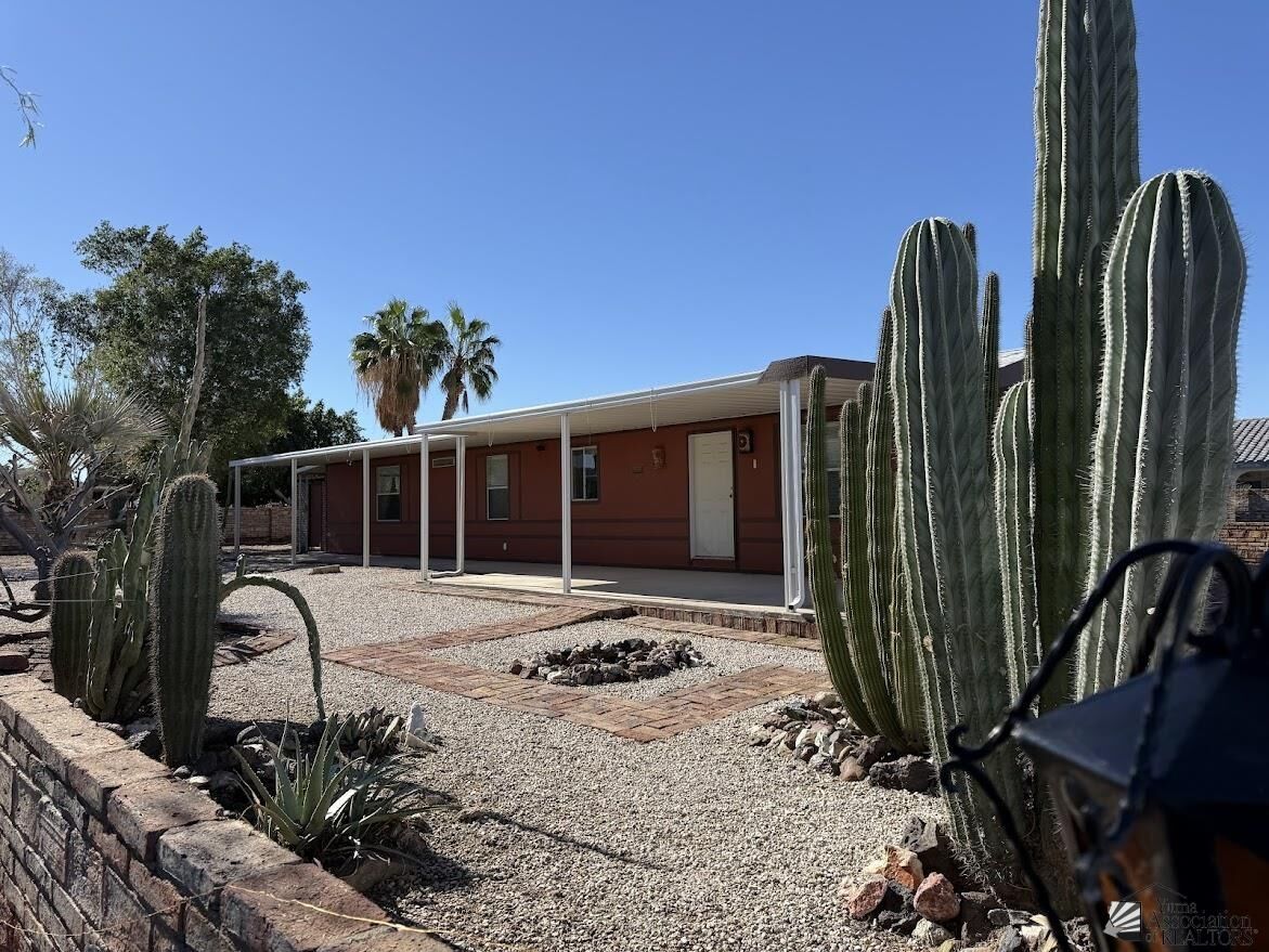 Property Photo: 13823 E 46 St AZ 85367