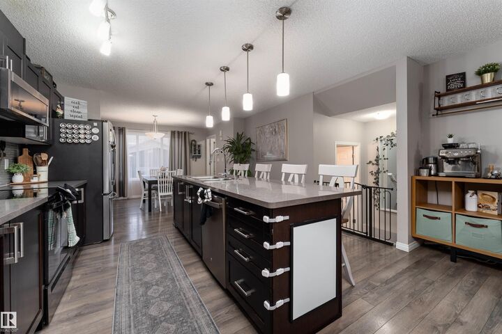 Property Photo:  8533 Ellis Link NW  AB T6M 0P5 