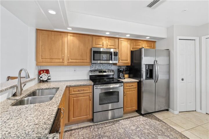 Property Photo:  13010 Amberley Ct 205  FL 34135 