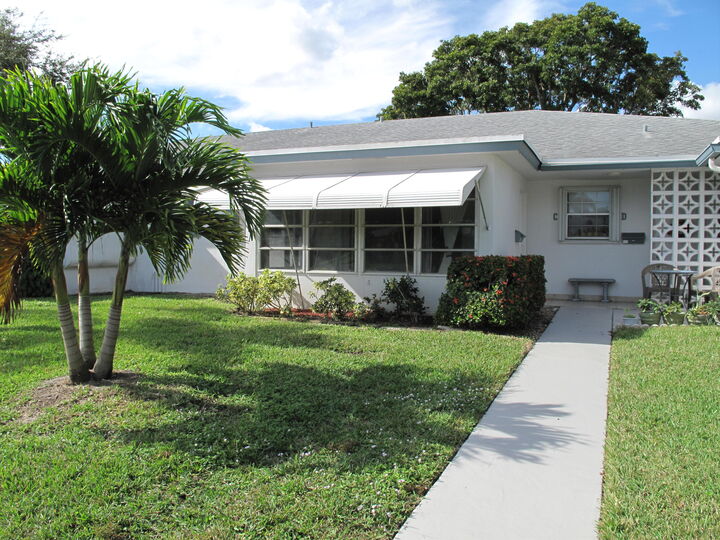 Property Photo:  1102 North Drive C  FL 33445 
