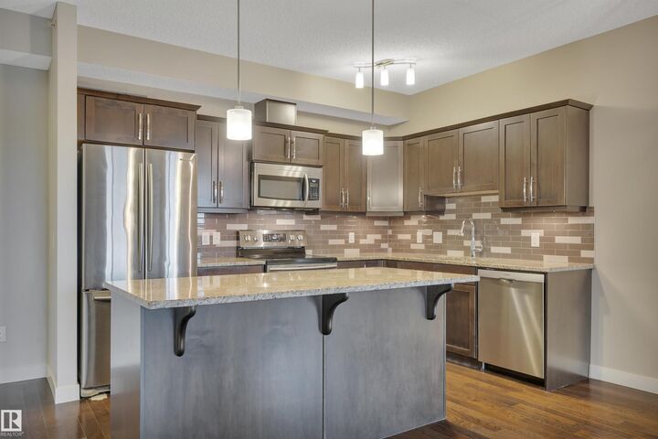 Property Photo: 10520 56 Avenue NW 409 AB T6H 0X7