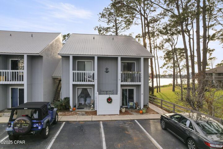 Property Photo: 6909 N Lagoon Drive 3E FL 32408