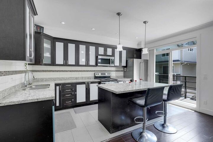 Property Photo: 6383 140 Street 9 BC V3W 0E9