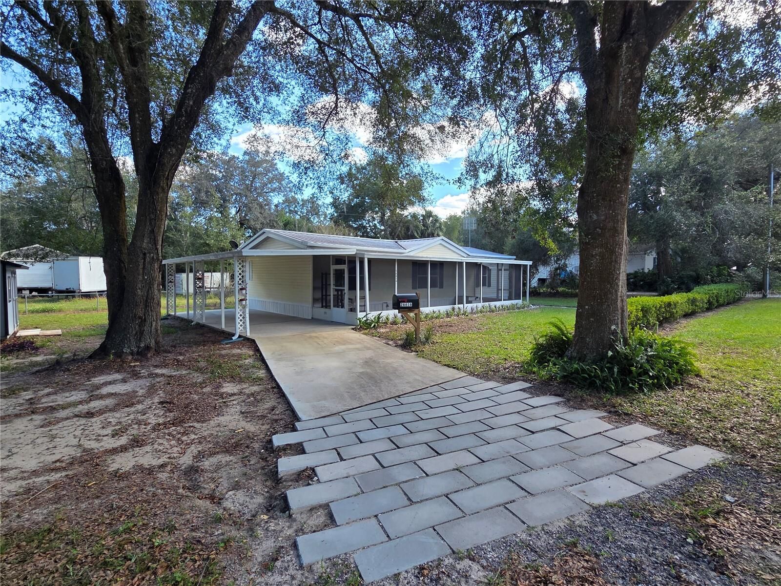 Property Photo:  26616 June Avenue  FL 32736 
