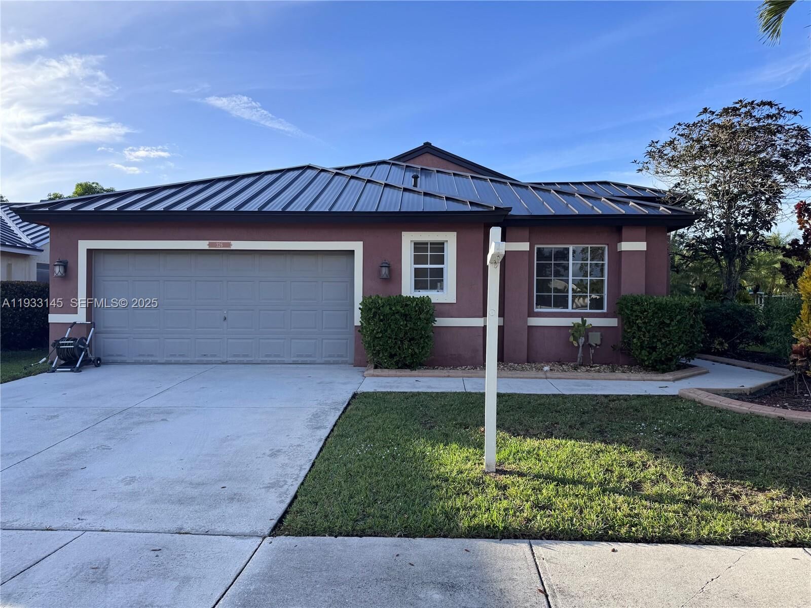 Property Photo:  326 SW 162nd Ave  FL 33027 