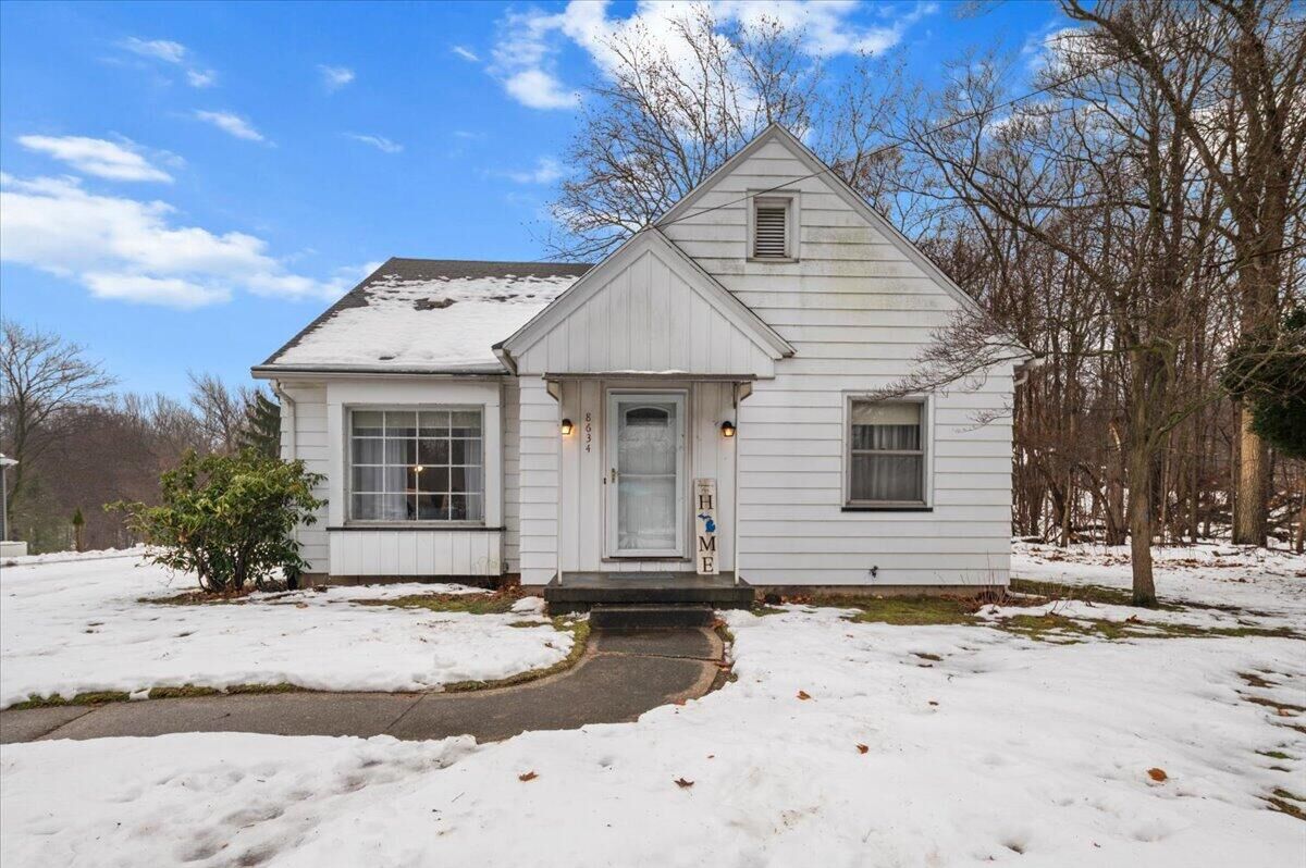 Property Photo:  8634 Division Court SE  MI 49315 