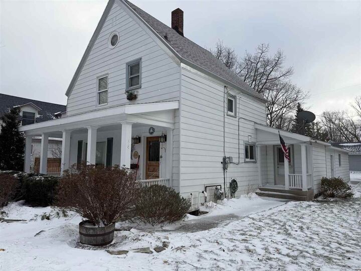 Property Photo:  114 E Hurlbut  MI 49720 