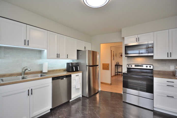 Property Photo:  5727 W Wisconsin Ave 5729  WI 53213 