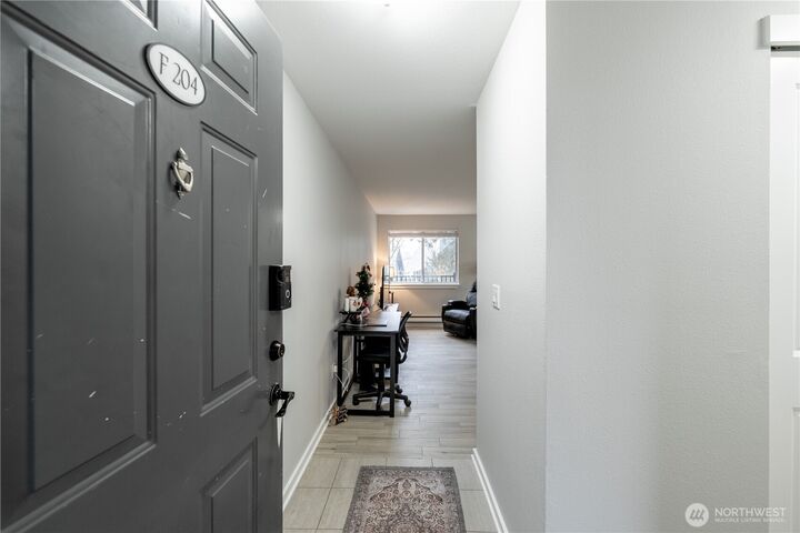 Property Photo:  15415  35th Avenue W F204  WA 98087 