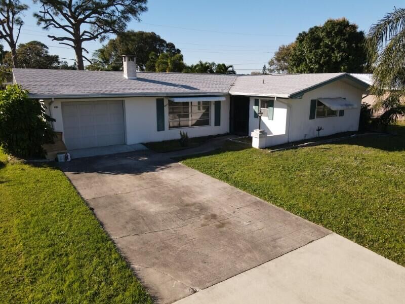 Property Photo:  408 E Coconut Avenue  FL 34952 