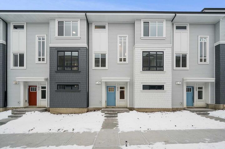 Property Photo:  857 Belmont Drive SW #210  AB T2X 4P2 